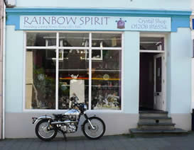 Graham's Royal Enfield parked outside Rainbow Spirit Crystal Shop