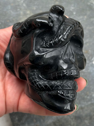 Obsidian Skull with Snakes from Crystal Skulls