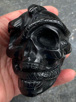 Obsidian Skull with Snakes from Crystal Skulls