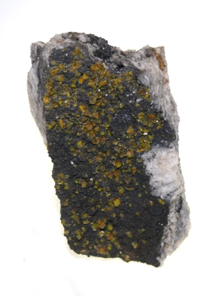 Campylite on Manganese Oxide Coating on Quartz from E S Treseder Collection